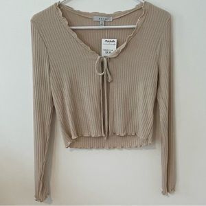 Gaze long sleeve shirt with open tie front.